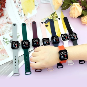 Close-up of colorful LED digital watches with silicone straps and square display screen