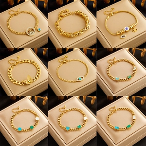 Bracciale da Donna in Acciaio Inossidabile Oro Con Ciondoli Malocchio Farfalla Cuore Strass Gioielli alla Moda
