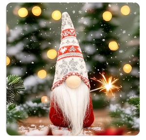 Close-up of a handmade Christmas gnome with knitted hat and long beard on festive background