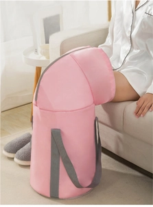 Pink portable foldable foot soak bag with knee-high design and sturdy grey handles