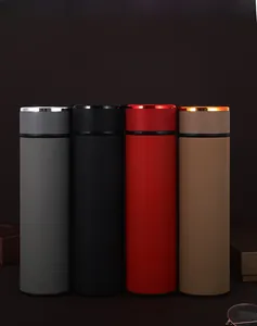 Close-up of smart insulated bottles featuring LED temperature display on four matte lids