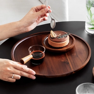 Minimalist round wooden tray with dark natural wood grain for cafe desserts and coffee