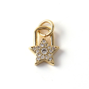 Detailed view of a gold-plated star pendant with shimmering micro-pave cubic zirconia