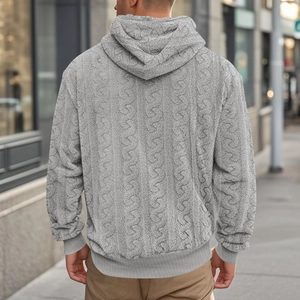 Rear view of men's grey hooded teddy fleece sweatshirt with textured cable knit patterns