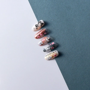 Detail of 5D embossed nail stickers featuring Nine-Tailed Fox and floral relief art