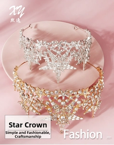 Detailed close-up of luxurious gold and silver star bridal crowns with sparkling crystals