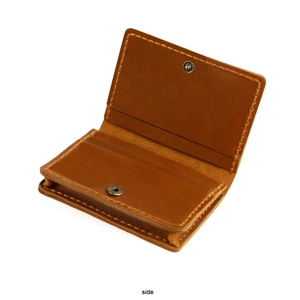Side view of handmade crazy horse leather card holder with vintage metal snap closure