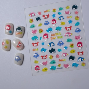 Macro detail of 5D embossed ocean animal nail stickers with colorful cartoon sea creatures