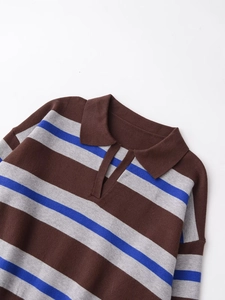 Close-up of the V-neck polo collar and striped knit texture on a long-sleeve shirt
