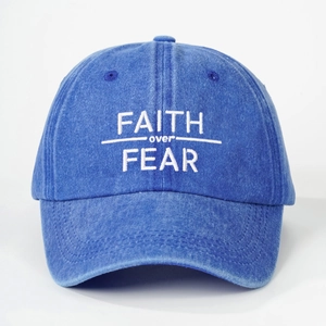 Navy blue washed cotton baseball cap with FAITH over FEAR embroidery and curved brim