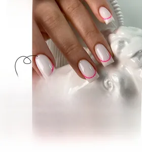 Detail of square-oval creamy white press-on nails with vibrant pink arched stripe patterns