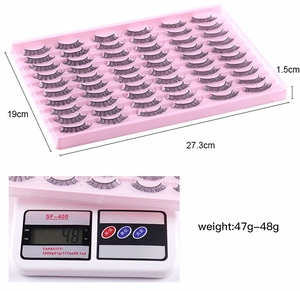 Detailed view of synthetic eyelashes tray with package dimensions and product weight