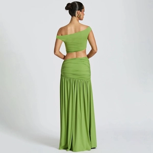 Detail view of the back of a green two-piece set featuring a ruched high-waist maxi skirt