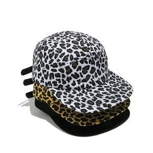 Flat brim 5-panel corduroy snapback hats in leopard print and solid black colors