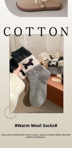 Detailed close-up of thick Fair Isle wool socks featuring a cute puppy pattern and cozy texture
