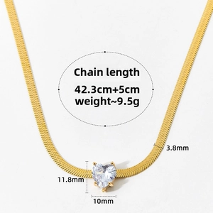 Detail of gold herringbone snake chain with heart zircon pendant and size measurements