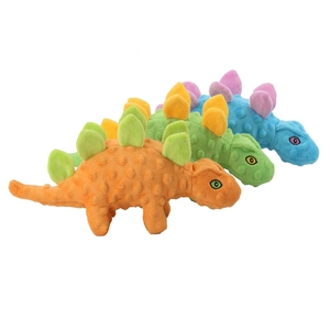 Stegosaurus squeaky plush dog toy with textured nub fabric for teething and chewing