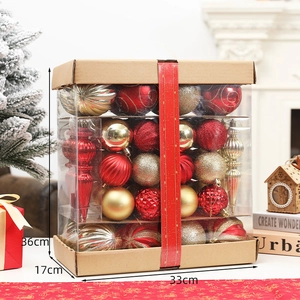 Detailed view of red and gold Christmas ball set dimensions 33x17x36cm with diverse textures