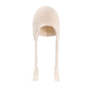Detail of cream white knit baby hat showing thick texture and braided earflap tassels