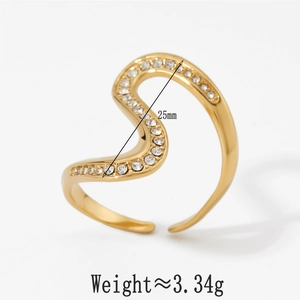 Detailed view of gold S-shaped ring with pavé rhinestones and 25mm height dimension