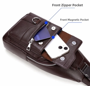 Detail of dark brown leather chest bag showing front zipper pocket and magnetic flap