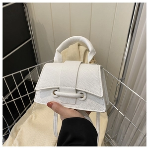 White faux leather crossbody bag with lychee texture and stylish top handle design