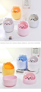 Close-up of mini cartoon desktop trash can with transparent lid and cute animal face