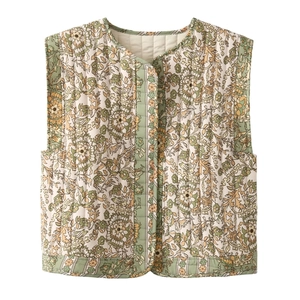 Close-up of bohemian floral print and quilted texture on women's vest jacket