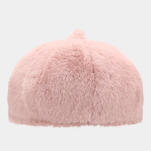Close-up of soft pink plush beret showing fuzzy faux rabbit fur texture and warm fabric