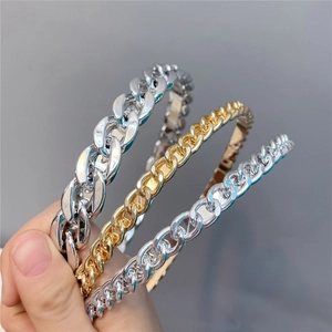 Chic metallic chain headbands set in gold and silver finish for a trendy retro look