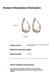 Macro detail of twisted U-shape hoop earrings with 5.2cm size and 925 silver needle