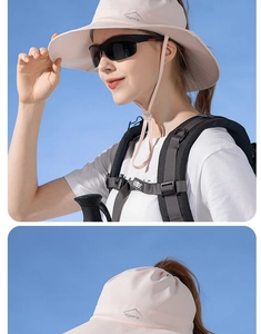 Détail du chapeau de soleil rose avec trou pour queue de cheval et cordon réglable
