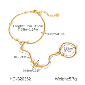 Dimensions détaillées du bracelet de doigt en acier doré avec zircon cœur et perles
