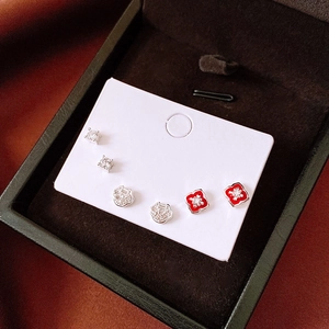 Detailed set of 3 stud earrings including zircon, silver lock, and red enamel flowers