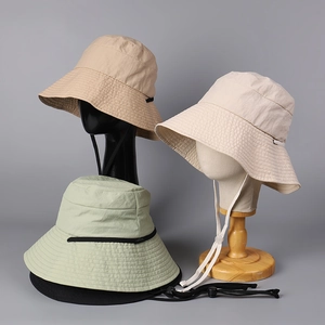 Minimalist wide brim sun hat in quick-dry nylon with adjustable chin strap and sun protection