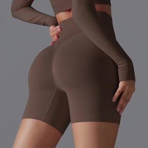 Close-up of high-waisted seamless yoga shorts in coffee brown with scrunch butt detail
