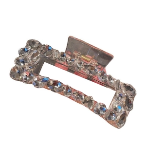 Elegant rectangle shark hair claw with sparkling crystals on transparent acrylic base