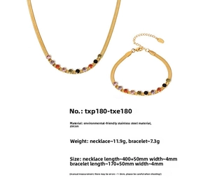 Detailed view of 18k gold plated stainless steel set with colorful zircon stones
