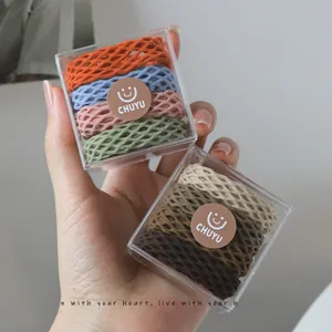 Detailed view of elastic mesh hair ties in assorted vibrant and earthy color sets
