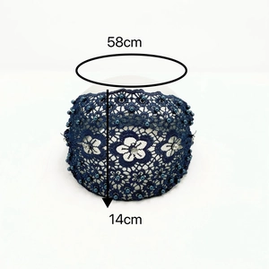 Detail view of navy blue lace headband with pearls and rhinestones, 58cm by 14cm size