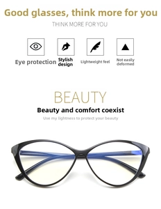 Detail of black cat-eye glasses frame with blue light blocking lenses and metal hinges