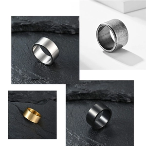 Detailed comparison of 10mm matte brushed titanium steel rings in gold, black, and silver