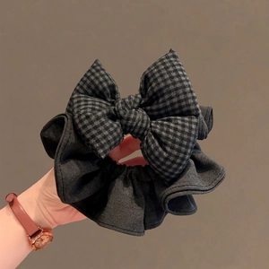 Chouchou élégant à carreaux noirs et gris avec nœud en tissu texturé pour femme