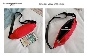 Detailed view of red canvas waist bag showing interior storage and size comparison