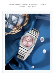 Detail of GEDI luxury silver watch with pink dial and sparkling diamond-set bezel