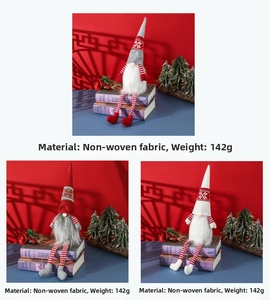 Detail of Christmas gnomes with striped legs and snowflake hats in festive setting