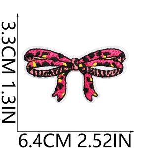 Pink leopard print bow embroidered patch detail with precise measurements in cm and inches