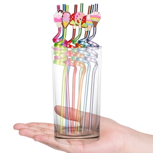 Set of 8 colorful reusable spiral straws with cute silicone ice cream charms in glass