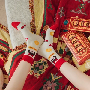 Red and white Year of the Snake cotton socks with lucky embroidery and festive patterns