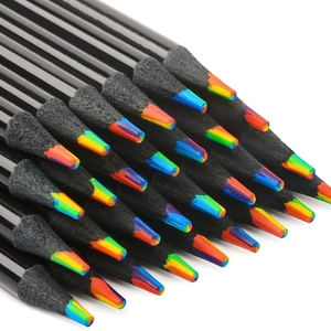 Macro shot of 4-color rainbow pencil tips with sleek black wooden barrels for drawing